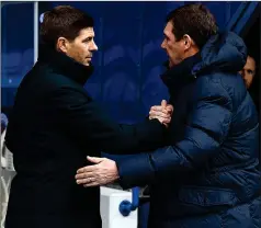  ??  ?? SHAKE ON IT: Steven Gerrard and Tommy Wright at full-time