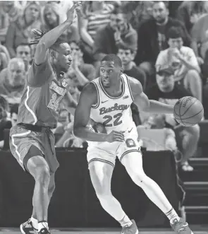  ?? SCOTT AUDETTE/AP ?? Ohio State guard Malaki Branham dribbles against Florida guard Phlandrous Fleming Jr. on Wednesday. The Buckeyes committed a season-high 18 turnovers that Florida turned into 22 points.