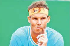  ?? Photo — AFP ?? Spain's Rafael Nadal reacts during the semi final tennis match against Italy's Fabio Fognini at the Monte-Carlo ATP Masters Series tournament on April 20, 2019 in Monaco.