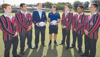  ?? Picture: GETTY IMAGES ?? Wallabies assistant coach and ex-student Nathan Grey (centre) with Spencer Jeans, Zane Nonggorr, Tom van der Schyff, Campbell Parata, Tyrell Kopua and Ronan Kapi at TSS.