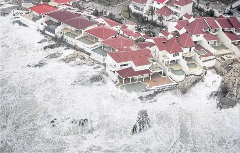  ?? EPA ?? Swells pound a resort on St Maarten on Thursday as Hurricane Irma rampaged across the Caribbean.