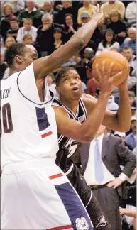  ?? Bob Child / Associated Press ?? Providence’s Ryan Gomes, right, dominated Emeka Okafor and the rest of UConn for 26 points and 12 rebounds on Jan. 24, 2004, in an effort that led to one of Jim Calhoun’s most famous postgame rants.