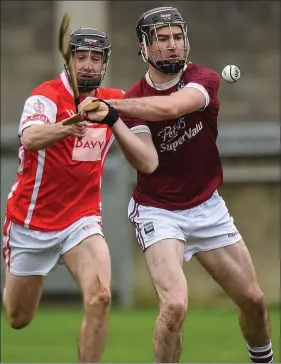  ??  ?? Paudie Kelly prepares to clear as Cuala’s Nicky Kenny tries to hook the defender.
