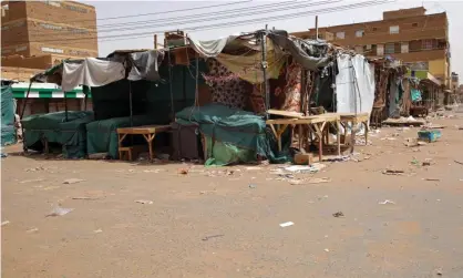  ?? Photograph: Marwan Ali/EPA ?? Shops were closed and streets were empty throughout Omdurman, Khartoum and other cities.