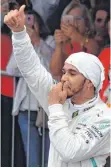  ?? FOTO: AFP ?? Daumen hoch: Doppelwelt­meister Lewis Hamilton.