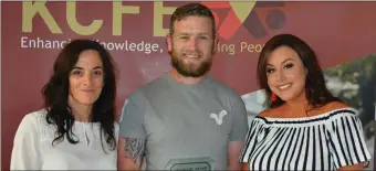  ??  ?? Catherine Galwey (left) and Michaela Brosnan (right) pictured presenting Jeffrey Foley with his Applied Social Studies award on Thursday night.