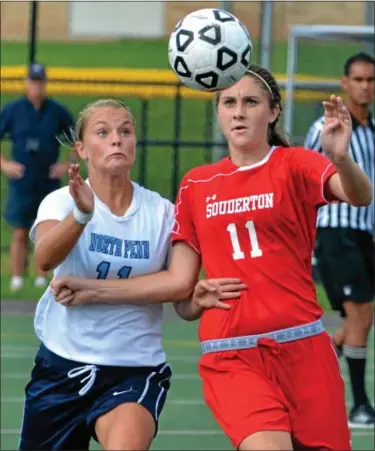  ?? For Montgomery Media / MARK C. PSORAS ?? North Penn’s Elizabeth Ricci and Souderton’s Haley Tierney battle for a ball in the air during Thursday’s Suburban One Continenta­l Conference game.