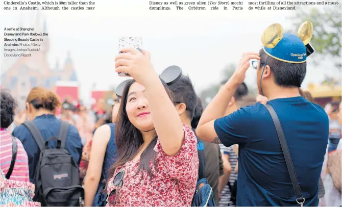  ??  ?? A selfie at Shanghai Disneyland Park (below); the Sleeping Beauty Castle in Anaheim. Photos / Getty Images; Joshua Sudock/ Disneyland Resort