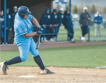  ?? ANDREW BURKE-STEVENSON/DAILY SOUTHTOWN ?? Reavis’ Anthony Tanas takes a swing against Lemont in Burbank on Thursday.