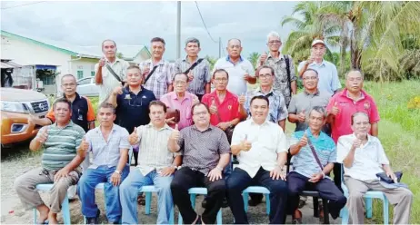  ??  ?? Lembat (seated fourth right) and Brian (seated third right) and other unofficial longhouse chiefs in a group photo after the meeting.