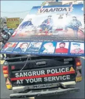  ??  ?? ■ Police taking away the poster of a music album by Rocky Bhatti near Government Ranbir College in Sangrur on Wednesday. HT PHOTO