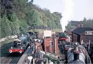  ?? CHRIS BLADON ?? A view from the DFR’s early days at Parkend station in 1974, with Peckett 0-4-0ST Uskmouth 1 in steam on the short siding, adjacent to the Severn & Wye Railway goods shed, that served as the preservati­on society’s running line. Under restoratio­n in the foreground is No. 5541 (which returned to steam the following year) and in the main platform are ‘Manor No. 7812 Erlestoke Manor and ‘Large Prairie’ No. 4150. These two had arrived from Barry scrapyard behind Class 25 diesel No. 25165 in May 1974, but did not stay long before moving on to the Severn Valley Railway, in the ‘Manor’s’ case via the Ashchurch steam centre.