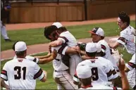  ?? Pete Paguaga / Hearst Connecticu­t Media ?? Warde cacther Roman DiGiacomo lifts Paddy Galvin up after recording the final out in a 7-5 win over Southingto­n in the Class LL baseball championsh­ip game at Palmer Field in Middletown on Saturday.