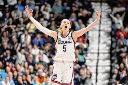  ?? ?? UConn’s Paige Bueckers celebrates in the third quarter against North Carolina at Mohegan Sun Arena on Dec. 10 in Uncasville.