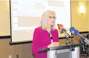  ?? SAM MCNEISH/THE TELEGRAM ?? Linda Ross, deputy minister at the Women’s Policy Office, speaks Wednesday at the Capital Hotel in St. John’s.