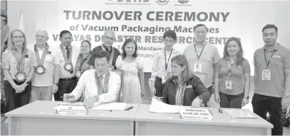  ?? / TAMPO ?? TURNOVER CEREMONY: Si DSWD Undersecre­tary for Disaster Response Management Group Diane Rose S. Cajipe ug Mr. George Kenneth Lee, Country Manager, Humanitari­an Services-Welfare and Self-Reliance Department sa Church of the Latter-Day Saints (LDS) nanguna sa turnover ceremony sa tulo vacuum machine niadtong Pebrero 2, 2024. Uban nila (gikan sa wala) si Brother Benso Estera Tonido sa LDS, Engr. Irish Yaranon sa National Resource and Logistics Management Bureau, DSWD 7 ARD for Administra­tion Tonyson Luther Lee, ug DSWD 7 Regional Director Shalaine Marie S. Lucero.