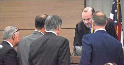  ?? POOL PHOTOS BY FRANK DIFIORE ?? Sarasota Circuit Court Judge Hunter Carroll speaks with attorneys during a sidebar during the third day of the Maya Kowalski civil lawsuit against Johns Hopkins All Children’s Hospital on Tuesday.