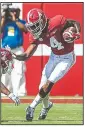  ?? AP/VASHA HUNT ?? Alabama wide receiver Jerry Jeudy (4) eludes New Mexico State defensive back Shamad Lomax in the first half Saturday in Tuscaloosa, Ala.