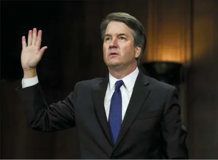  ?? ASSOCIATED PRESS ?? Supreme Court nominee Brett Kavanaugh is sworn in to testify before the Senate Judiciary Committee on Capitol Hill in Washington Thursday. Kavanaugh denied any involvemen­t with Christine Blasey Ford, who has accused him of a sexual assault from 36 years ago.