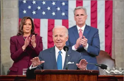  ?? JACQUELYN MARTIN, POOL ?? President Joe Biden delivers the State of the Union address to a joint session of Congress at the U.S. Capitol on Tuesday in Washington, as Vice President Kamala Harris and House Speaker Kevin McCarthy of California applaud.