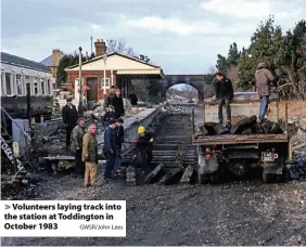  ?? GWSR/John Lees ?? Volunteers laying track into the station at Toddington in October 1983