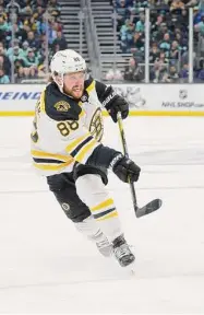  ?? John Froschauer/Associated Press ?? The Bruins and right wing David Pastrnak have agree to an eight-year $90 million extension.