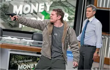  ??  ?? Working-class New Yorker Kyle Budwell (Jack O’Connell) takes out his frustratio­ns on the crew of the financial advice TV show Money Monster.