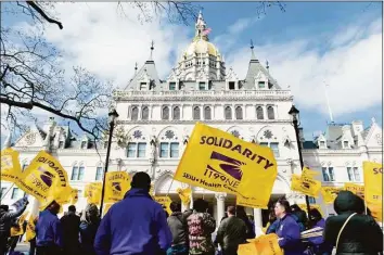  ?? Contribute­d / SEUI 1199 ?? Health care workers with the SEIU 1199 New England held a rally at the state Capitol in Hartford, demanding fully funded contracts.