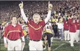  ??  ?? TROJANS COACH Pete Carroll raises his arms after USC’s 34-31 stunning win over Notre Dame.
