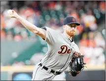  ??  ?? Detroit Tigers starting pitcher Spencer Turnbull throws against the Houston Astros during the first inning of a baseball game on Aug 20 in Houston.