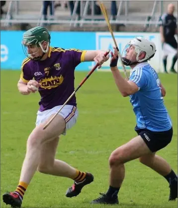  ??  ?? Wexford full-forward Jack Cullen grabs the ball and puts pressure on Dublin’s Ben McHugh.
