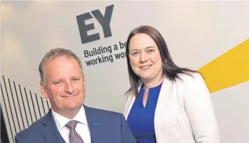  ??  ?? PARTNERSHI­P: Senior partner Derek Leith and new addition Gemma Noble form part of the Aberdeen team at profession­al services firm EY