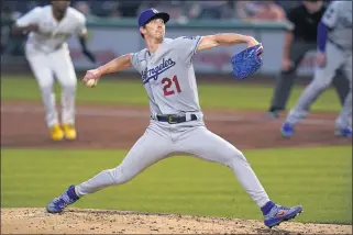  ?? GENE J. PUSKAR — THE ASSOCIATED PRESS ?? Dodgers starting pitcher Walker Buehler threw seven shutout innings Tuesday in L.A.’s win over the Pirates.