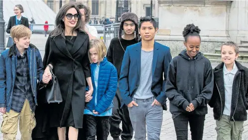  ?? Pictures: MARC PIASECKI/GC IMAGES,GEORGE PIMENTEL/GETTY ?? Divorce dispute...Angelina Jolie and the six children she shares with Brad Pitt, Maddox, Pax, Zahara, Shiloh, Vivienne and Knox