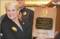  ?? SUBMITTED PHOTO ?? Former Mayor Carolyn T. Comitta with the plaque presented to her by the West Chester Police Department.