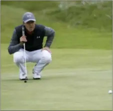  ?? PETER MORRISON — THE ASSOCIATED PRESS ?? Jordan Spieth 14th hole. of the United States lines up a putt on the