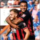  ??  ?? FLYING RYAN: Fraser celebrates with team-mate Josh King (right)