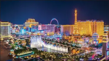  ?? SHUTTERSTO­CK.COM ?? A light-rail ride down the center of the Las Vegas Strip could be an enticing tourist attraction itself, as visitors have a chance to take in the sights without having to negotiate with traffic.