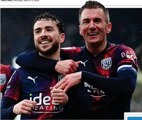  ?? GETTY IMAGES ?? Hugs: Jed Wallace (right) congratula­tes Johnston on making it 4-1 to West Brom