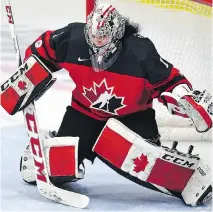  ?? JASON KRYK/THE CANADIAN PRESS ?? Goaltender Shannon Szabados, seen in Monday’s game against Russia at the world championsh­ips in Plymouth, Mich., says she’d like to play in “one more Olympics.”