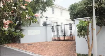  ??  ?? This eight-bedroomed guest house in Muizenberg will be auctioned by Rawson Auctions on April 25. The property includes a separate two-bedroom private home for the owner.