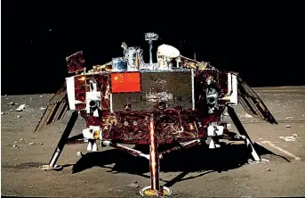  ??  ?? An artist’s view shows China’s robot craft Chang’e-4, which has landed in the Von Karman crater, a flatter region located within the Moon’s South Pole-Aitken Basin.