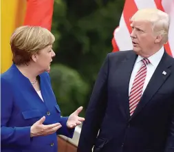  ?? FOTO AFP ?? Durante la cumbre del G7 en Italia, Trump se encontró con la canciller alemana, Angela Merkel, que lo llamó después del encuentro “socio no fiable”.