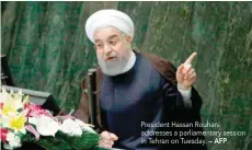  ?? — AFP ?? President Hassan Rouhani addresses a parliament­ary session in Tehran on Tuesday.