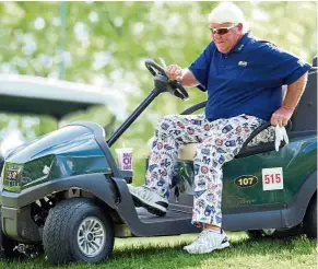  ?? — Reuters ?? Awkward: John Daly getting out of his cart on the third green during the first round of the PGA Championsh­ip on Thursday.