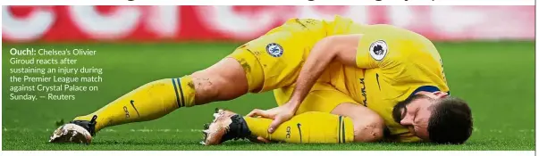  ??  ?? Ouch!:Chelsea’s Olivier Giroud reacts after sustaining an injury during the Premier League match against Crystal Palace on Sunday. — Reuters