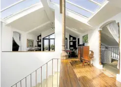  ?? ?? Skylight roofing admits steady stream of light. The third floor is designed to be transforme­d in the future as the family’s needs evolve.