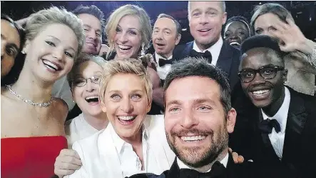  ?? THE ASSOCIATED PRESS ?? The Oscar selfie shows Jennifer Lawrence, Meryl Streep, Ellen DeGeneres, Bradley Cooper, Peter Nyong’o Jr., Channing Tatum, Julia Roberts, Kevin Spacey, Brad Pitt, Lupita Nyong’o and Angelina Jolie.