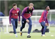  ?? — Reuters ?? England’s Harry Kane, Dele Alli and Raheem Sterling during training.