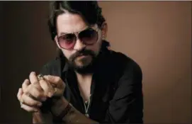  ?? PHOTO BY CHRIS PIZZELLO — INVISION — AP ?? In this photo, singer-songwriter Shooter Jennings, son of iconic country musicians, Waylon Jennings and Jessi Colter, poses for a portrait in Los Angeles.